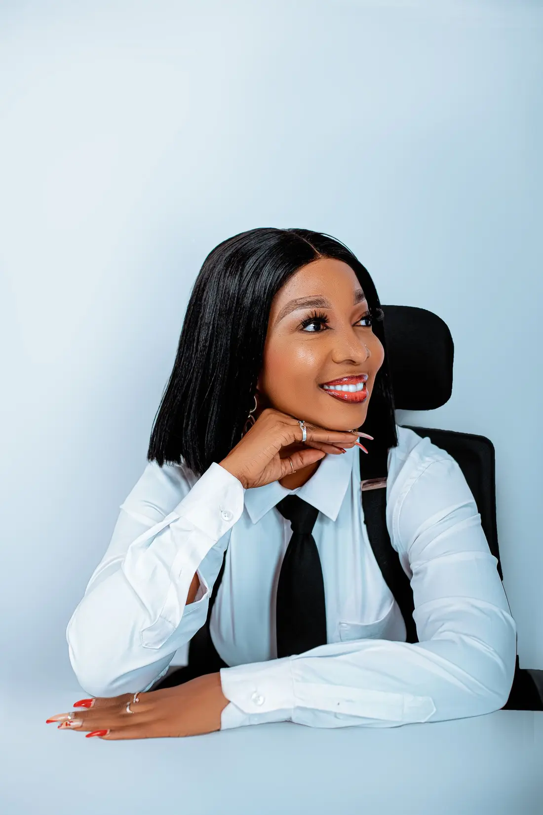 Professional woman smiling in an office setting