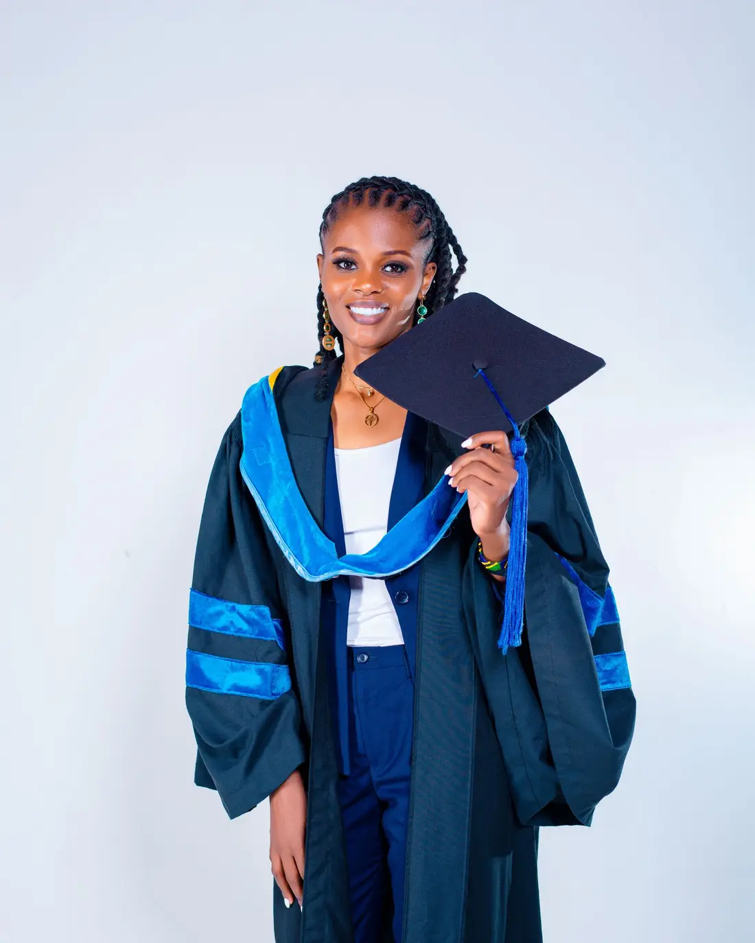 Smiling woman in a graduation gown